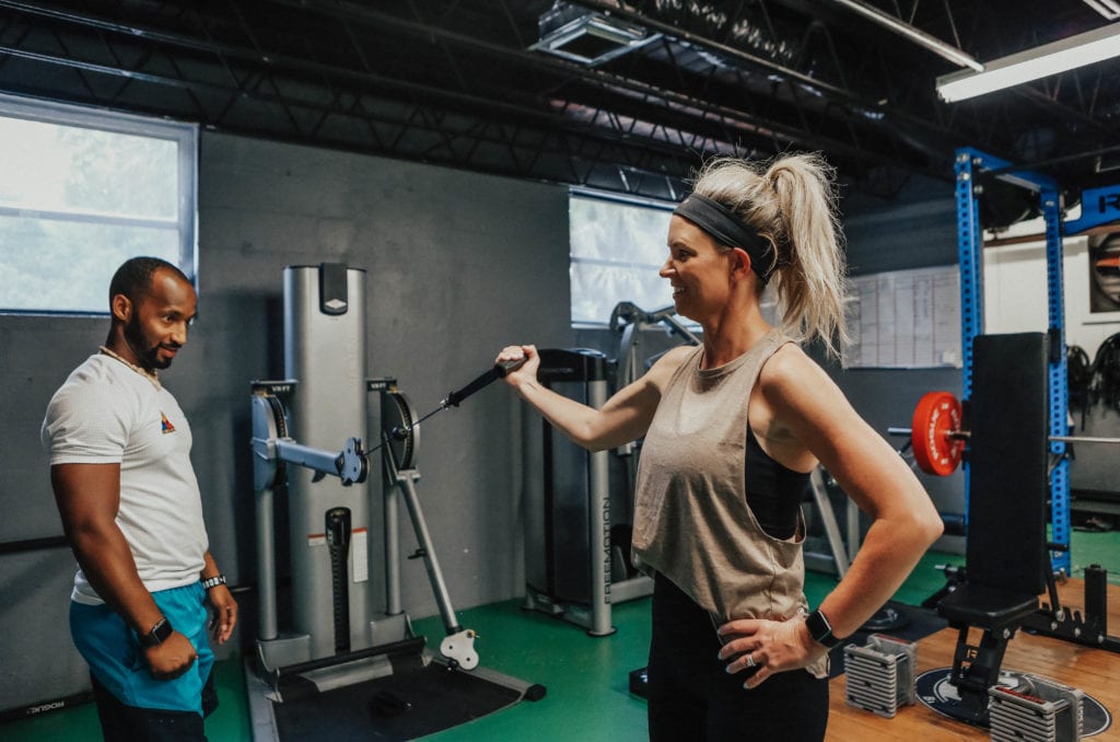 a woman working out her arms